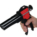 side view of BI70 with hand for size comparison