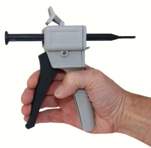 dual cartridge caulk gun